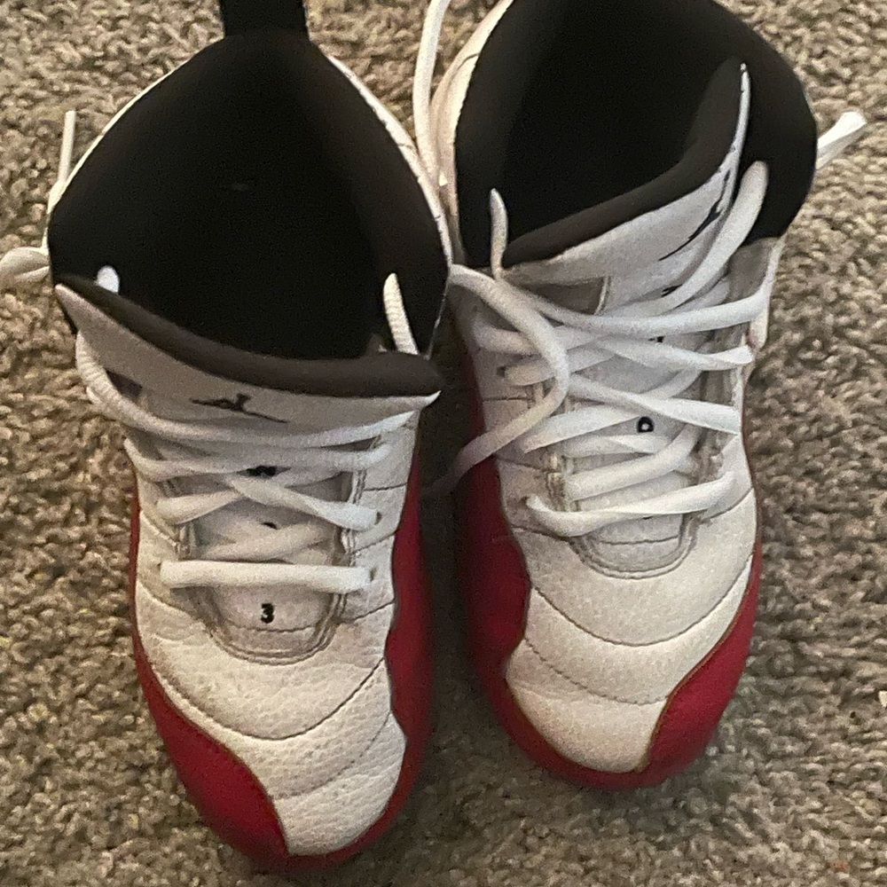 red and white Jordan 12